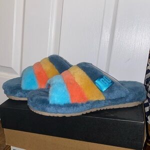 BRAND NEW. NEVER WORN UGG SLIPPERS.
